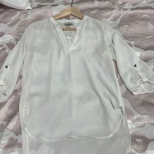 White blouse with gold buttons